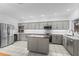 Spacious kitchen featuring updated appliances and lighting at 103 Odin Dr, Winter Haven, FL 33884