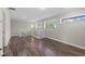 Upstairs living room with hardwood floors and lots of natural light at 103 Odin Dr, Winter Haven, FL 33884