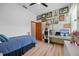 Comfortable bedroom featuring stylish decor, a large window, and closet at 1107 Almond Tree Cir, Orlando, FL 32835