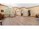 Bright living room with hardwood floors, large windows, and an open-concept design at 1107 Almond Tree Cir, Orlando, FL 32835