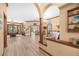 Expansive view of the open-concept living room leading to the backyard and other rooms at 1107 Almond Tree Cir, Orlando, FL 32835