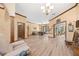 Spacious living room with light-colored walls, hardwood floors, and access to the backyard at 1107 Almond Tree Cir, Orlando, FL 32835