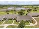 Aerial view of home highlighting a picturesque pond, lush greenery, and neighborhood at 1146 Villa Ln # 101, Apopka, FL 32712