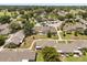 Aerial view of the community showcasing a parking area and golf carts at 1146 Villa Ln # 101, Apopka, FL 32712