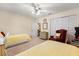 Inviting bedroom featuring two twin beds, ceiling fan, and closet space at 1146 Villa Ln # 101, Apopka, FL 32712