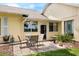 Outdoor patio area with seating, perfect for relaxing and entertaining at 1146 Villa Ln # 101, Apopka, FL 32712