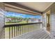 Inviting balcony with views of the green lawn and swimming pool at 148 Olive Tree Cir # 148, Altamonte Springs, FL 32714