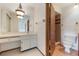 Bathroom features a vanity, sink, mirror, toilet, and a tiled shower stall at 148 Olive Tree Cir # 148, Altamonte Springs, FL 32714
