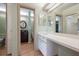 Bathroom with a vanity, mirror, toilet, and walk-in closet at 148 Olive Tree Cir # 148, Altamonte Springs, FL 32714
