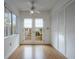 Bright room with a ceiling fan, closet, wood floor, and exterior door at 148 Olive Tree Cir # 148, Altamonte Springs, FL 32714