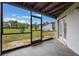 Screened porch with slate tile and view of backyard at 148 Olive Tree Cir # 148, Altamonte Springs, FL 32714