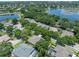 Aerial view of the neighborhood featuring a large pond at 1515 Cherry Lake Way, Lake Mary, FL 32746