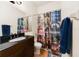 Cozy bathroom featuring a dark vanity, shower with a unique curtain, a toilet, and colorful accents for charm at 1515 Cherry Lake Way, Lake Mary, FL 32746