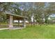 A picnic pavilion with room for seating near playground on a manicured green space at 1515 Cherry Lake Way, Lake Mary, FL 32746