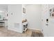 Entrance way showcasing tile floors and a charming console table at 15411 Taurus Ct, Mascotte, FL 34753