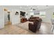 Comfortable living room with modern decor and ample seating space at 15411 Taurus Ct, Mascotte, FL 34753
