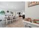 Open living space combines dining and living areas with lots of natural light at 15411 Taurus Ct, Mascotte, FL 34753