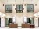Spacious lobby with high ceilings, stylish lighting, and reception desks at 15695 Grove Resort Ave # 4412, Winter Garden, FL 34787