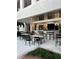 Outdoor bar and lounge area with comfortable seating, perfect for relaxing outside at 15695 Grove Resort Ave # 4412, Winter Garden, FL 34787