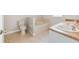 Bathroom featuring dual sinks, a soaking tub and a toilet at 160 Conch Dr, Kissimmee, FL 34759