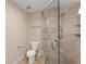 Bathroom featuring glass shower and toilet at 17 S Aurora Dr, Apopka, FL 32703