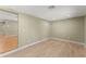 A spacious living room displays wood floors, neutral wall paint, and recessed ceiling lights at 17 S Aurora Dr, Apopka, FL 32703