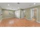 Main bedroom features wood floors, recessed lighting, and an en suite bathroom at 17 S Aurora Dr, Apopka, FL 32703
