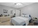 Spacious bedroom with closet, comfortable bed, and neutral decor at 217 Spencer St, Orlando, FL 32839