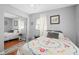Well-lit bedroom with closet, comfortable bed, and decorative accents at 217 Spencer St, Orlando, FL 32839