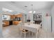 Eat-in kitchen with updated appliances, plenty of counter space, and a view into the living room at 217 Spencer St, Orlando, FL 32839