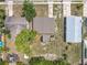 Birds-eye view of the home's location with mature trees and landscaped yard at 221 Golden Days Dr, Casselberry, FL 32707