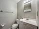 Neutral toned bathroom featuring a white vanity, chrome hardware and medicine cabinet at 221 Golden Days Dr, Casselberry, FL 32707