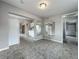 Open-concept kitchen and living area, featuring modern flooring and abundant natural light at 221 Golden Days Dr, Casselberry, FL 32707