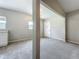 Open concept living space with access to a well-equipped kitchen and inviting front entrance at 221 Golden Days Dr, Casselberry, FL 32707