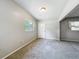 Bright living room with plenty of natural light and convenient access to the front door, inviting guests inside at 221 Golden Days Dr, Casselberry, FL 32707