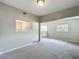 Bright living room featuring a seamless connection to the kitchen, enhancing open-concept living at 221 Golden Days Dr, Casselberry, FL 32707