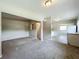 Spacious open-concept living area with neutral tones and ample natural light, ready for your personal touch at 221 Golden Days Dr, Casselberry, FL 32707