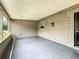 Enclosed back patio with neutral walls and flooring perfect for outdoor living at 221 Golden Days Dr, Casselberry, FL 32707