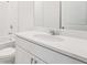 Modern bathroom featuring a white vanity with a sleek sink and tiled walls at 2502 Linda Knoll Ln, Bartow, FL 33830