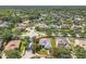 Aerial view of the property showcasing its location within a neighborhood surrounded by lush trees at 2528 Double Tree Pl, Oviedo, FL 32766