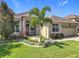 Charming single-story home with a well-manicured lawn and landscaped garden at 2528 Double Tree Pl, Oviedo, FL 32766