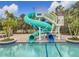 A thrilling waterslide plunges into the refreshing pool, promising endless fun and excitement for swimmers at 2528 Double Tree Pl, Oviedo, FL 32766