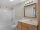 Bathroom with neutral paint, vanity storage and a shower and tub combo at 2666 Derbyshire Rd, Maitland, FL 32751