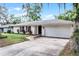 Charming one-story home with a well-maintained lawn and inviting curb appeal at 2666 Derbyshire Rd, Maitland, FL 32751