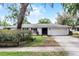 Well-maintained one-story home with a charming front exterior and landscaped yard at 2666 Derbyshire Rd, Maitland, FL 32751