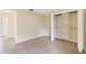 Bedroom featuring wood floors, a closet with shelving, and neutral walls at 2880 Trenton Ln, Deltona, FL 32738