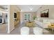 Bright living room with neutral walls, a ceiling fan, and patio access for seamless indoor-outdoor living at 2880 Trenton Ln, Deltona, FL 32738