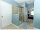 Bright bathroom featuring glass shower at 319 Morning View Dr, Winter Garden, FL 34787