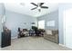 Bedroom with carpet and a ceiling fan alongside a desk, chair, sofa and whiteboard, great for a home office at 319 Morning View Dr, Winter Garden, FL 34787