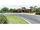 Exterior view of the community clubhouse featuring well-maintained landscaping and attractive architecture at 319 Morning View Dr, Winter Garden, FL 34787